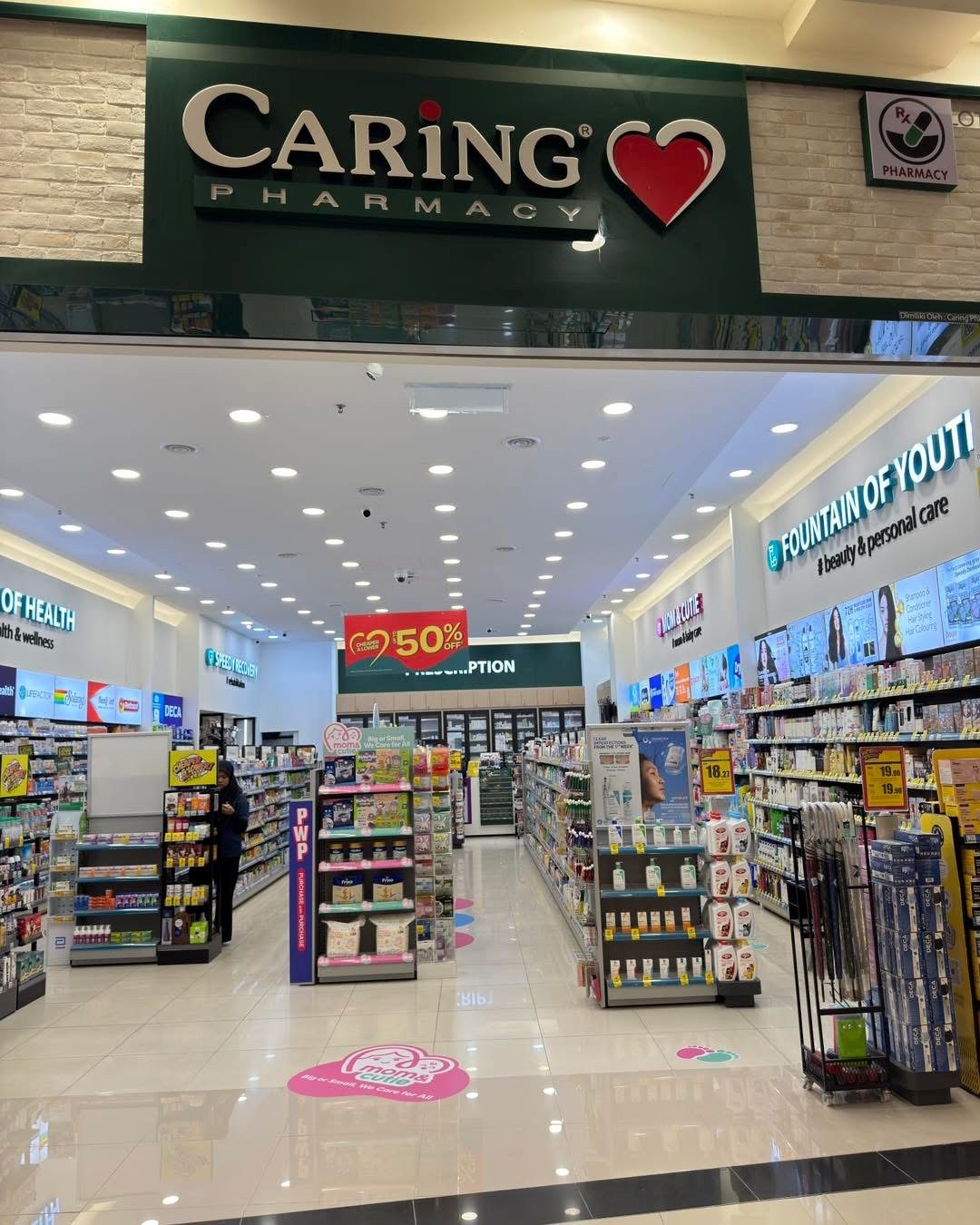 CARING PHARMACY